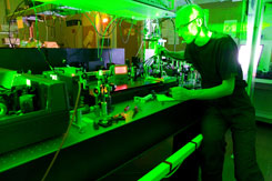 David Turton adjusting the laser system – (c) 2008 Klaas Wynne, University of Strathclyde, Physics Department, SUPA