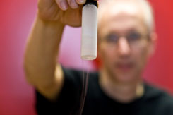  David Turton holding a vial of frozen glassy salt solution – (c) 2008 Klaas Wynne, University of Strathclyde, Physics Department, SUPA