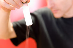  David Turton holding a vial of frozen glassy salt solution – (c) 2008 Klaas Wynne, University of Strathclyde, Physics Department, SUPA