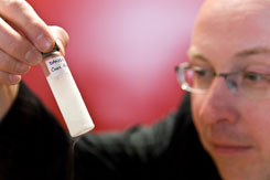 Klaas Wynne holding a vial of frozen glassy salt solution – (c) 2008 Klaas Wynne, University of Strathclyde, Physics Department, SUPA